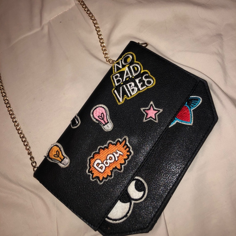 Clutch with shoulder strap